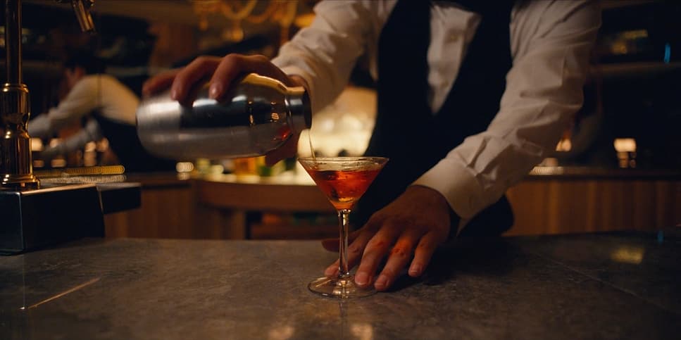 Bartender pouring a cocktail